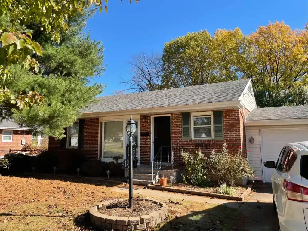 A brick house that was sold to Fast Lane Real Estate for cash