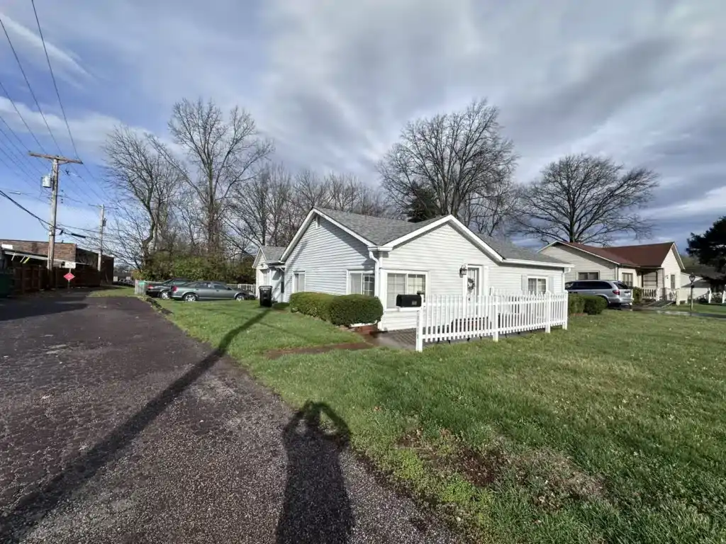 A white home in St. Louis that was sold as is for cash