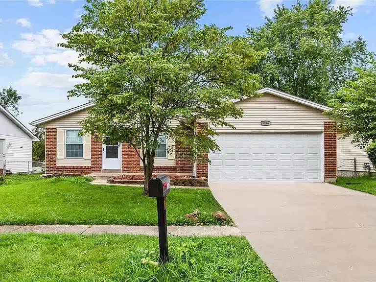 The front of a brick home in Florissant, Missouri