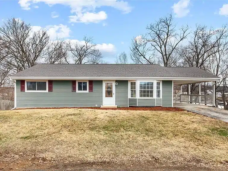 The front of a blue house in Fenton, Missouri