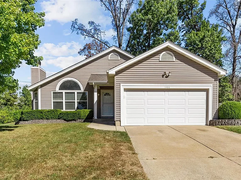 The front of a small home in St. Charles, MO