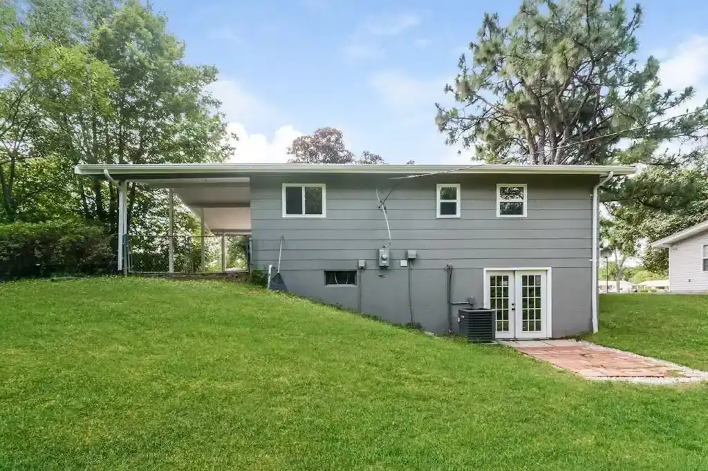 The back of a grey house in Fenton, Missouri